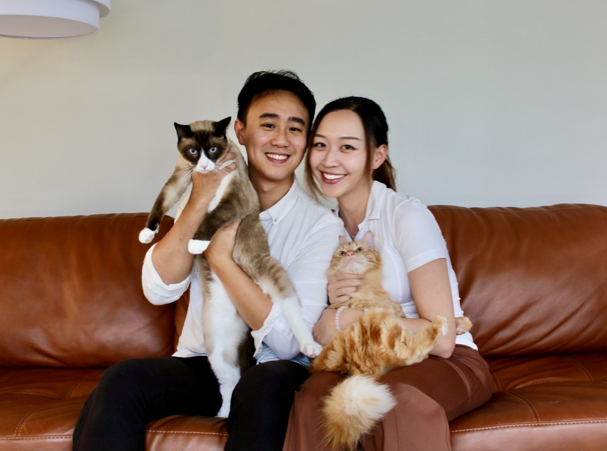Lina and Kevin with their cats